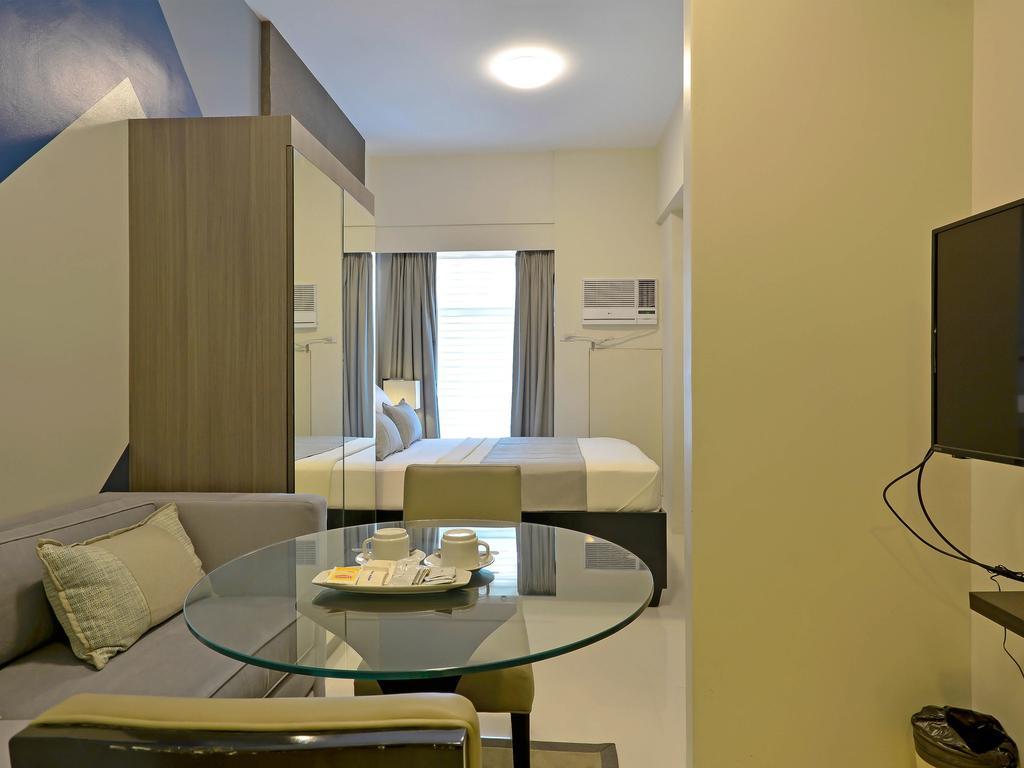 Currency Serviced Suites Manila Exterior foto