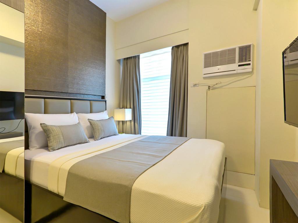 Currency Serviced Suites Manila Exterior foto
