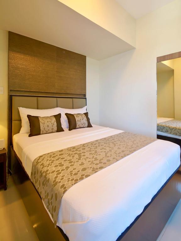 Currency Serviced Suites Manila Exterior foto