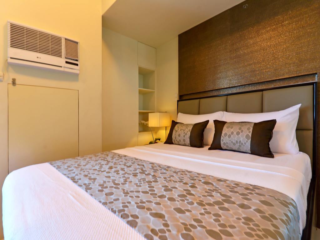 Currency Serviced Suites Manila Exterior foto